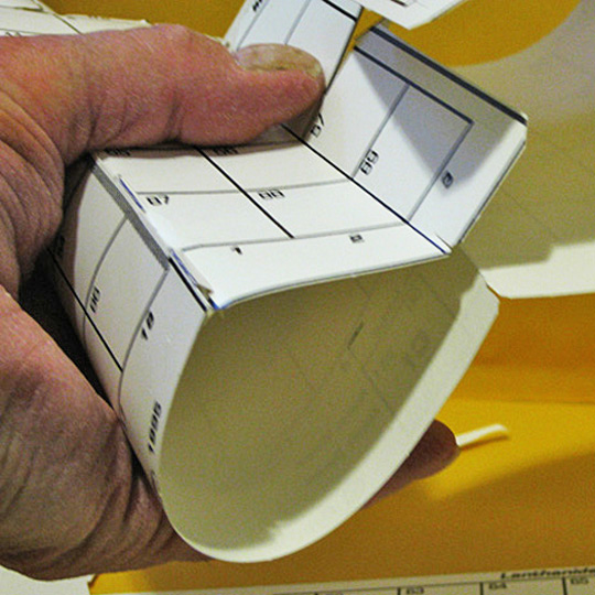 defining the blocks with bends at the scoring